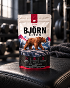 Björn Bites Hallon på en träningsbänk